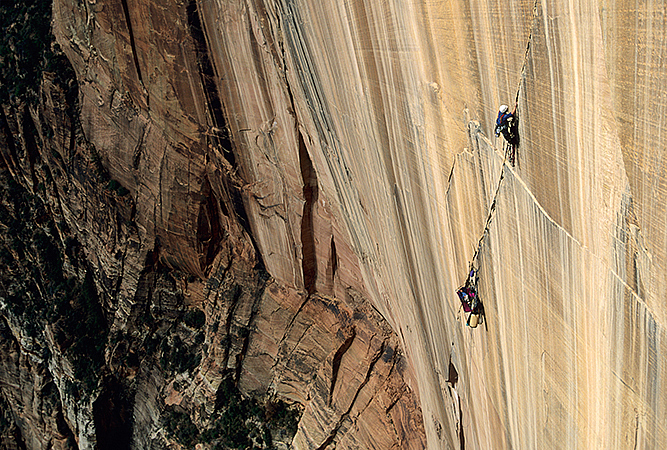 Brody Greer and Dave Littman climbing the Streaked Wall, Zion National Park